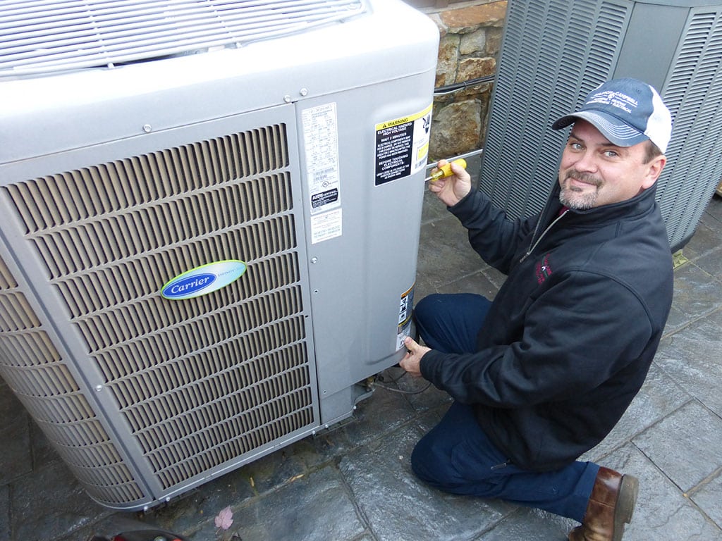 Technician working on unit